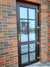 Деревянные входные двери из евробруса.